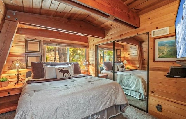 bedroom featuring wooden ceiling, visible vents, beamed ceiling, wooden walls, and carpet floors