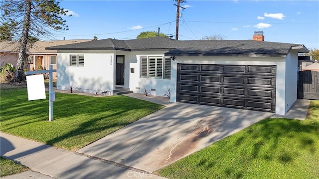 ranch-style home featuring an attached garage, a chimney, stucco siding, and driveway