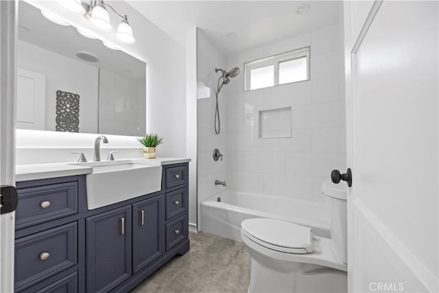 full bathroom with tile patterned flooring, toilet, vanity, and shower / washtub combination