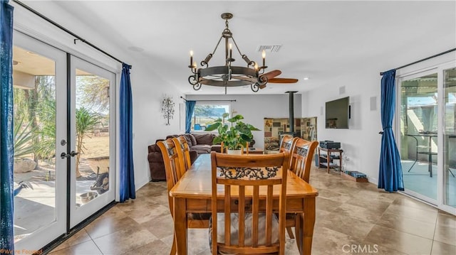 73950 22nd Ave, Desert Hot Springs, CA 92241 - dining room with light tile patterned flooring, a notable chandelier, baseboards, and visible vents