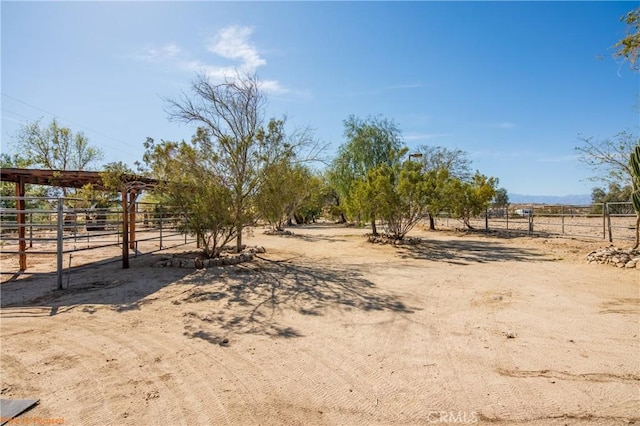 73950 22nd Ave, Desert Hot Springs, CA 92241 - view of yard with a rural view, an outbuilding, and an exterior structure