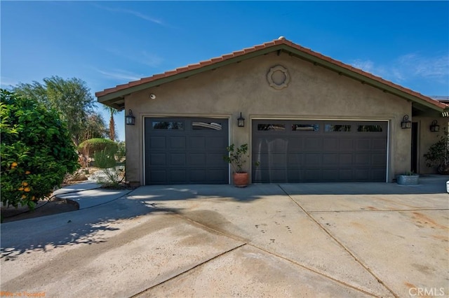 73950 22nd Ave, Desert Hot Springs, CA 92241 - garage featuring concrete driveway