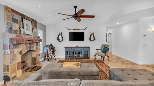 73950 22nd Ave, Desert Hot Springs, CA 92241 - tiled living room featuring ceiling fan, baseboards, arched walkways, and recessed lighting
