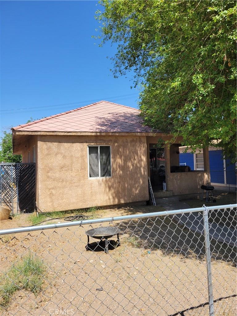 508 Acoma St, Needles, CA 92363 - exterior space with fence and stucco siding