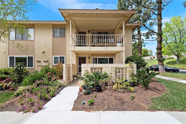 174 Avenida Majorca Unit A, Laguna Woods, CA 92637 - multi unit property with a balcony and stucco siding