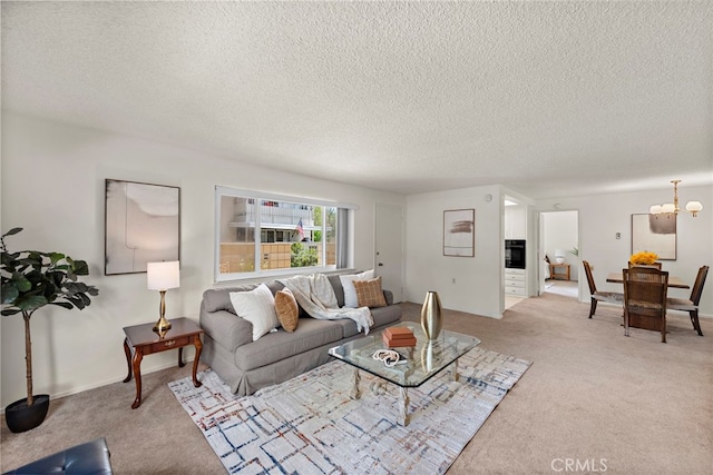 174 Avenida Majorca Unit A, Laguna Woods, CA 92637 - living area with a textured ceiling, carpet, and a notable chandelier