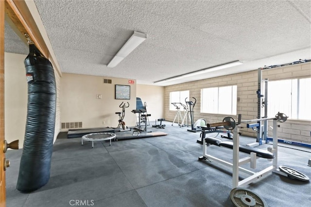 2501 W Redondo Beach Blvd Unit 238, Gardena, CA 90249 - exercise room featuring visible vents and a textured ceiling