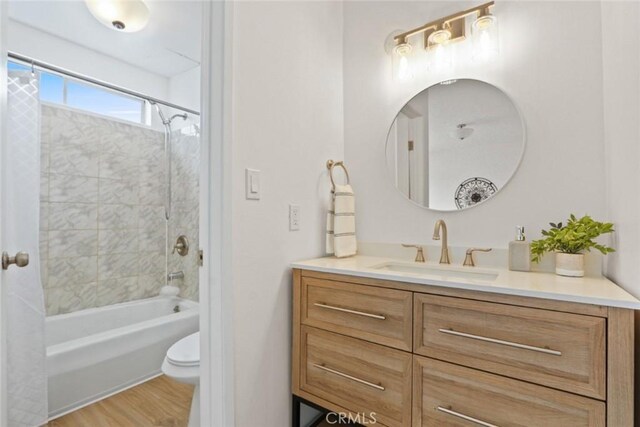 2501 W Redondo Beach Blvd Unit 238, Gardena, CA 90249 - bathroom with wood finished floors, shower / bath combination, vanity, and toilet