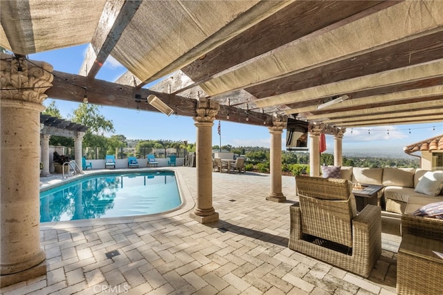 view of swimming pool with a pergola, a patio area, a fenced in pool, and an outdoor hangout area