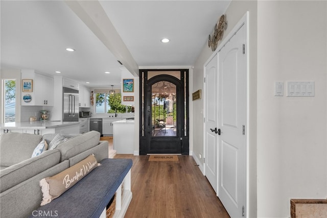 27361 Rainbow Ridge Rd, Palos Verdes Peninsula, CA 90274 - entryway with plenty of natural light, recessed lighting, wood finished floors, and arched walkways