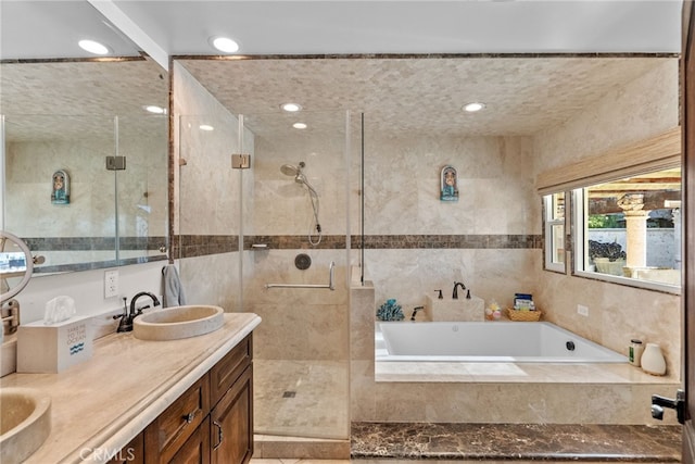 27361 Rainbow Ridge Rd, Palos Verdes Peninsula, CA 90274 - bathroom with a bath, double vanity, a stall shower, and tile walls