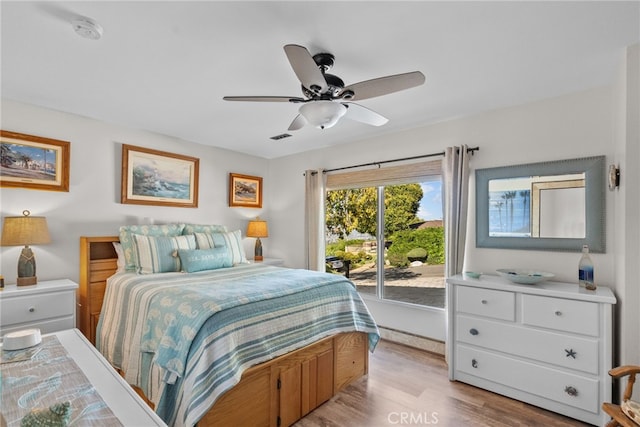 27361 Rainbow Ridge Rd, Palos Verdes Peninsula, CA 90274 - bedroom featuring access to exterior, light wood-style floors, and a ceiling fan