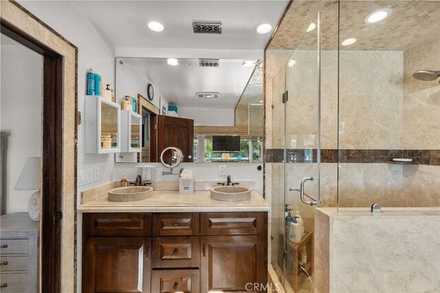 27361 Rainbow Ridge Rd, Palos Verdes Peninsula, CA 90274 - full bath with a stall shower, double vanity, and recessed lighting