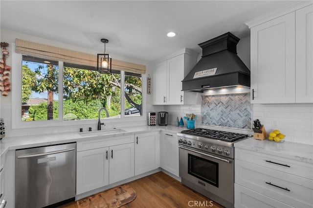 27361 Rainbow Ridge Rd, Palos Verdes Peninsula, CA 90274 - kitchen featuring appliances with stainless steel finishes, custom range hood, a sink, backsplash, and white cabinetry