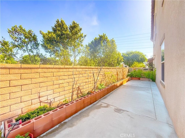 view of patio with a fenced backyard