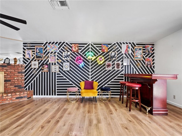904 Pinon Dr, Barstow, CA 92311 - playroom featuring wood finished floors, baseboards, and a ceiling fan