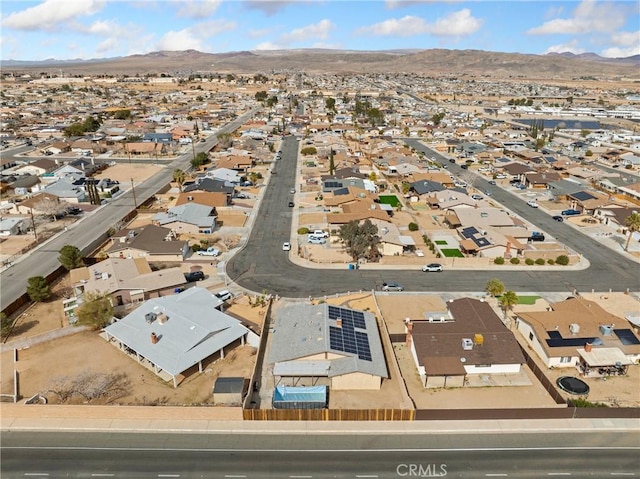 904 Pinon Dr, Barstow, CA 92311 - aerial overview of property's location with a mountainous background and nearby suburban area