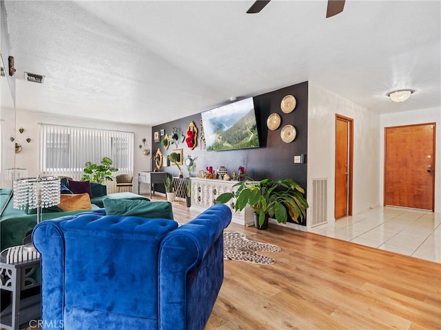 904 Pinon Dr, Barstow, CA 92311 - living area with ceiling fan and wood finished floors