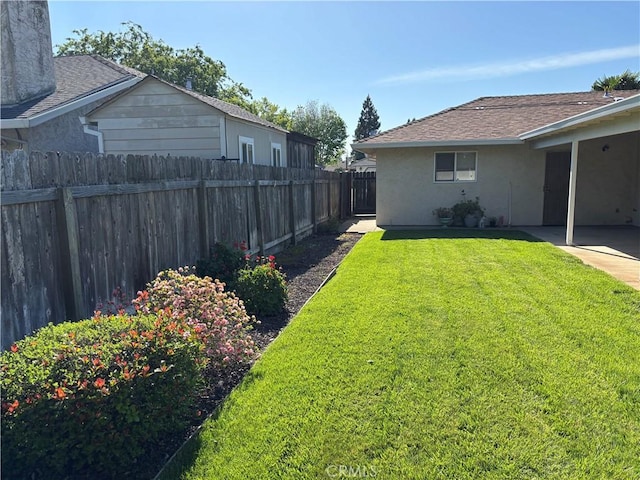 view of yard with fence