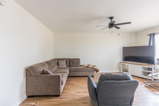 9213 Jacaranda Ave, California City, CA 93505 - living room with ceiling fan and light wood finished floors
