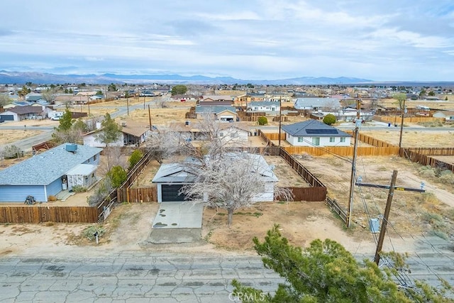 9213 Jacaranda Ave, California City, CA 93505 - aerial view of residential area with a mountain backdrop