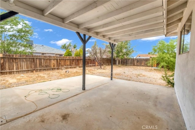9213 Jacaranda Ave, California City, CA 93505 - fenced backyard with a patio area