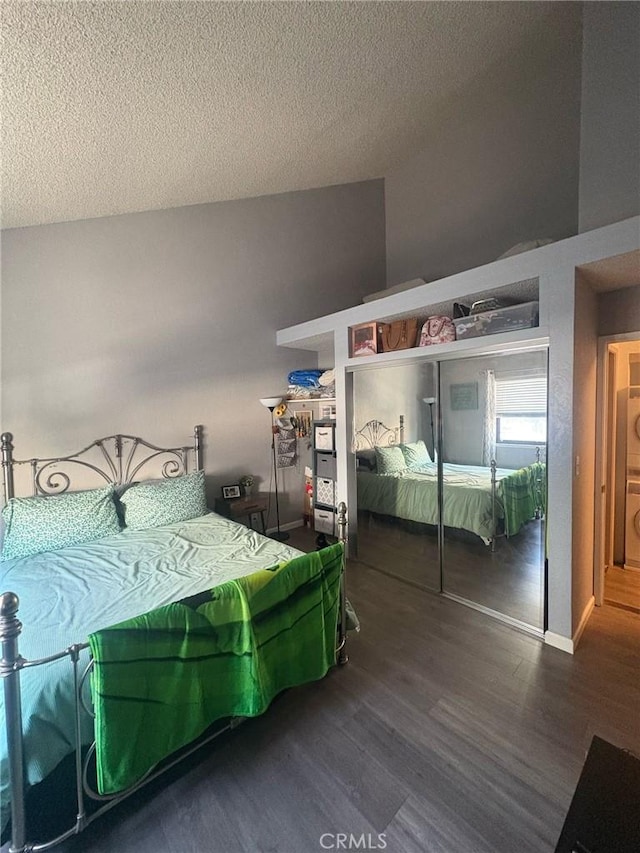 1 Appian Way Unit 710-6, San Francisco, CA 94080 - bedroom featuring wood finished floors, a closet, and a textured ceiling