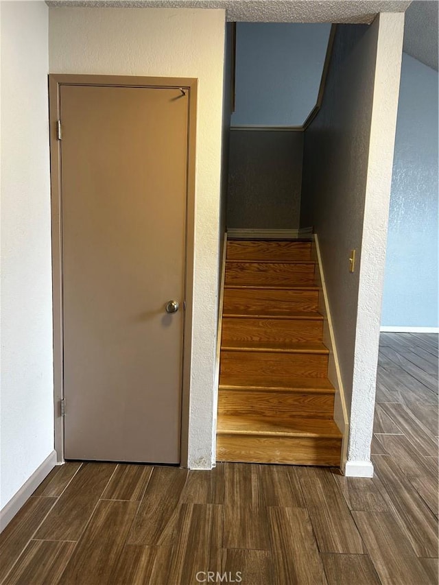 1 Appian Way Unit 710-6, San Francisco, CA 94080 - stairway with wood finished floors and a textured wall