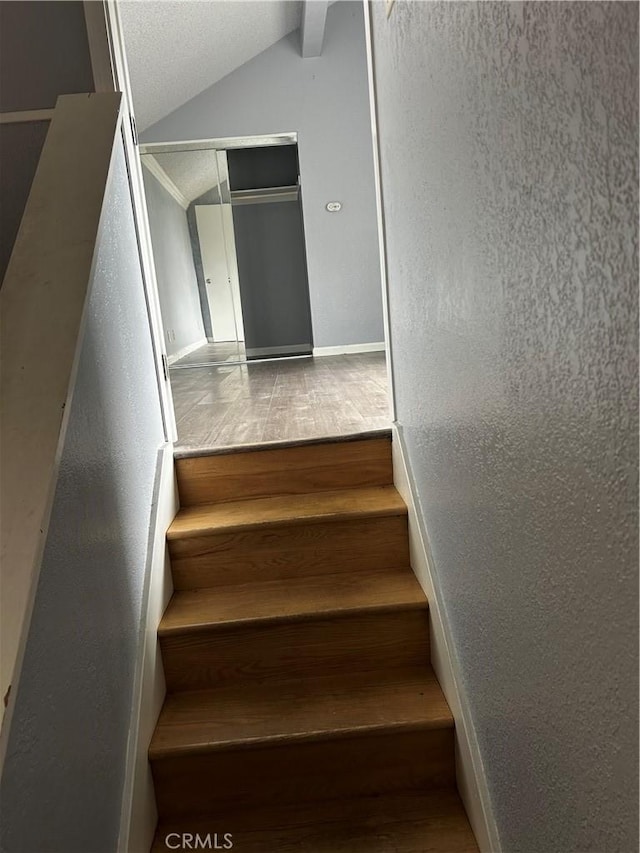 1 Appian Way Unit 710-6, San Francisco, CA 94080 - staircase with wood finished floors and a textured wall