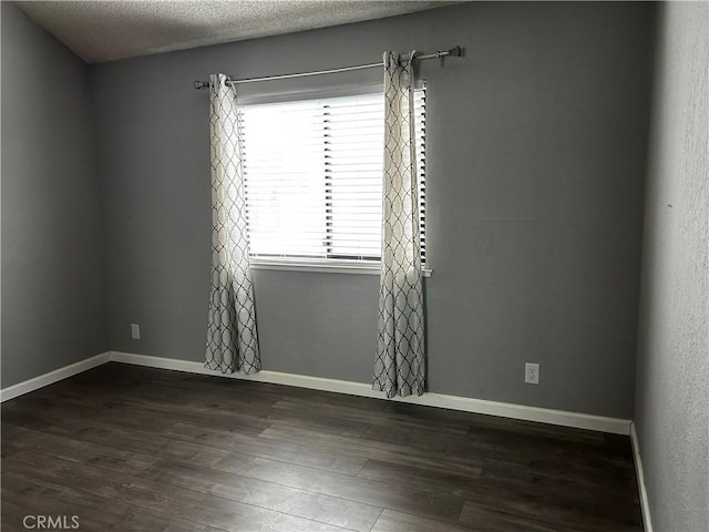 1 Appian Way Unit 710-6, San Francisco, CA 94080 - unfurnished room with dark wood-style flooring and a textured ceiling