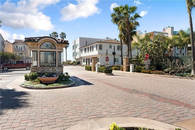 56 B Surfside Ave, Surfside, CA 90743 - exterior space featuring a tiled roof and a residential view