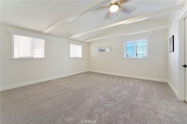 56 B Surfside Ave, Surfside, CA 90743 - spare room featuring vaulted ceiling with beams, carpet floors, and a healthy amount of sunlight