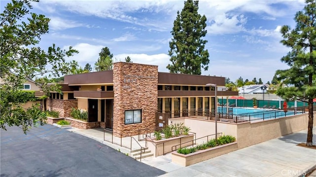 view of property featuring fence