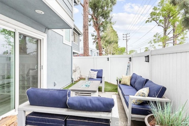 2218 Mayfair Ct, Costa Mesa, CA 92627 - view of patio with an outdoor living space with a fire pit and a fenced backyard