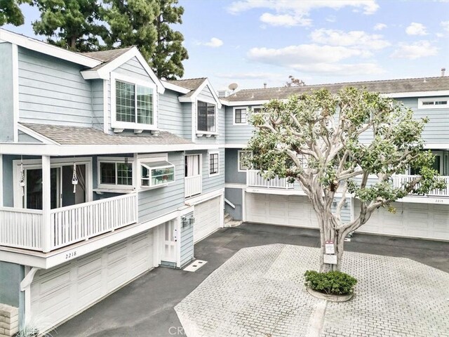 2218 Mayfair Ct, Costa Mesa, CA 92627 - view of property featuring driveway and an attached garage