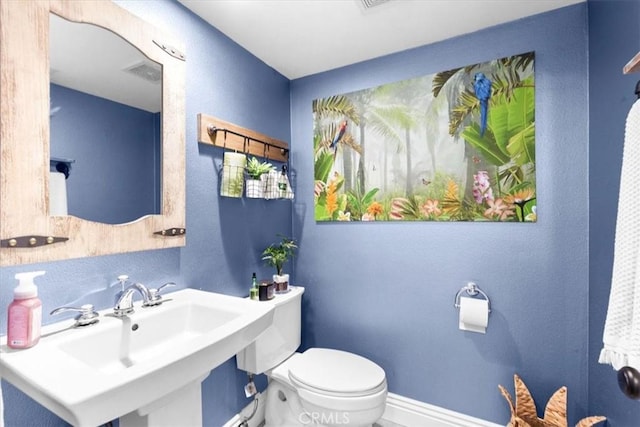 2218 Mayfair Ct, Costa Mesa, CA 92627 - bathroom with toilet, a sink, and baseboards