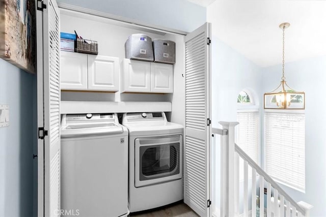 2218 Mayfair Ct, Costa Mesa, CA 92627 - clothes washing area featuring separate washer and dryer, cabinet space, a chandelier, and wood finished floors