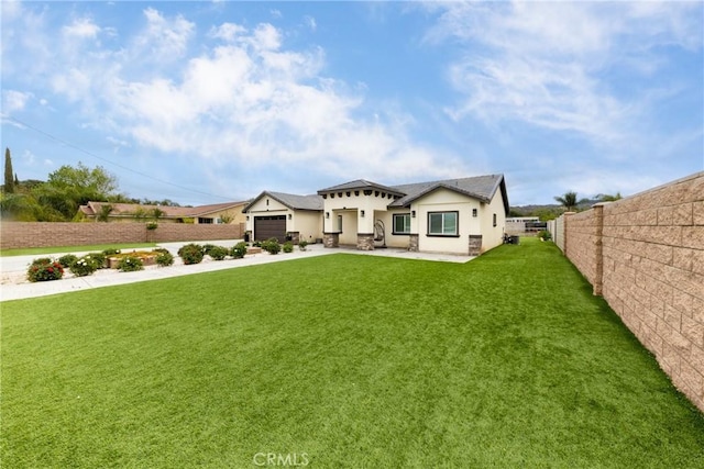20109 Hunter St, Perris, CA 92570 - back of property with fence, stucco siding, driveway, a lawn, and a garage