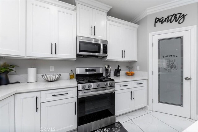 20109 Hunter St, Perris, CA 92570 - kitchen with ornamental molding, stainless steel appliances, white cabinetry, and light countertops