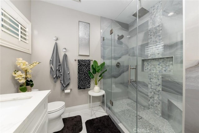 20109 Hunter St, Perris, CA 92570 - bathroom featuring a shower stall, marble finish floor, toilet, vanity, and baseboards