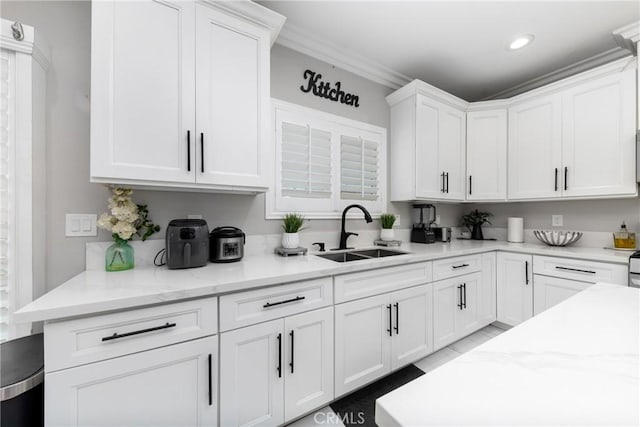 20109 Hunter St, Perris, CA 92570 - kitchen with white cabinets, light stone countertops, recessed lighting, and a sink