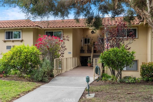 888 Ronda Sevilla Unit D, Laguna Woods, CA 92637 - view of front of house with a tile roof