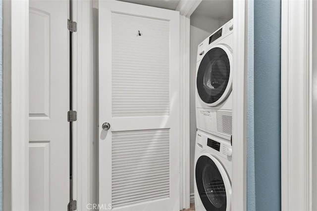 888 Ronda Sevilla Unit D, Laguna Woods, CA 92637 - laundry room with stacked washer and dryer and laundry area