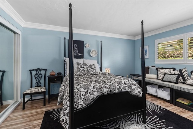 888 Ronda Sevilla Unit D, Laguna Woods, CA 92637 - bedroom with ornamental molding and wood finished floors