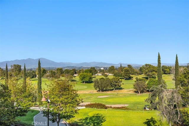 888 Ronda Sevilla Unit D, Laguna Woods, CA 92637 - view of property's community with a lawn, a mountain view, and golf course view