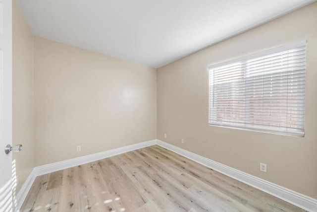 905 E 4th Ave Unit 1, National City, CA 91950 - spare room with baseboards and wood finished floors