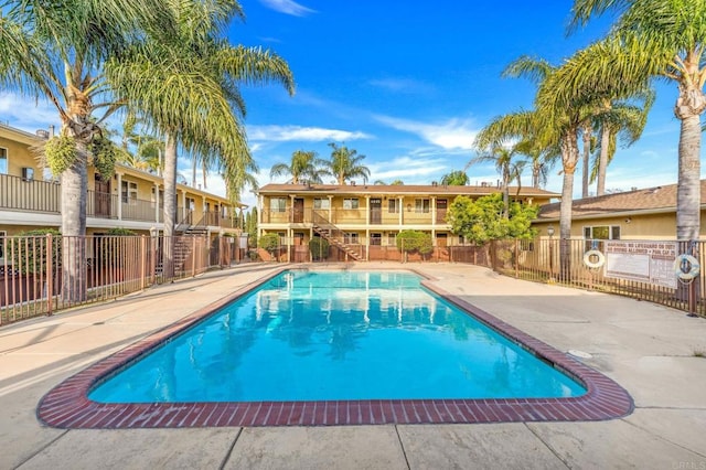 905 E 4th Ave Unit 1, National City, CA 91950 - community pool featuring stairs, fence, and a patio