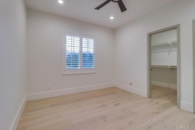 2850 Palmetto Point Ct, Chula Vista, CA 91915 - unfurnished bedroom featuring light wood finished floors, a walk in closet, recessed lighting, a closet, and ceiling fan