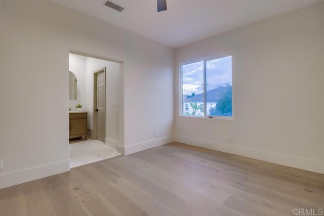 2850 Palmetto Point Ct, Chula Vista, CA 91915 - unfurnished bedroom with light wood finished floors, ensuite bath, and ceiling fan
