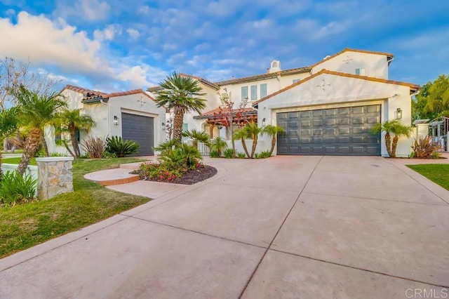 2850 Palmetto Point Ct, Chula Vista, CA 91915 - mediterranean / spanish-style house featuring a garage, driveway, and stucco siding